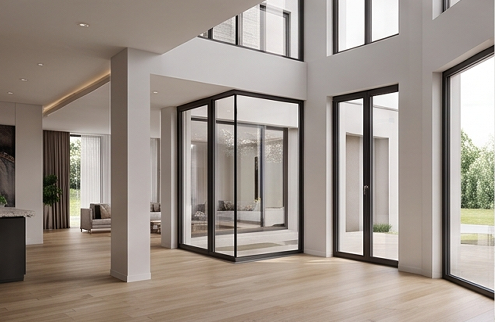 Espacio interior diáfano a doble altura, caracterizado por grandes cristaleras fijas y practicables en aluminio negro de la Serie E-75 HO, incluyendo una estructura saliente a modo de galería.